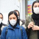 Iran, women with masks for coronavirus