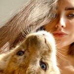 Istanbul, Iranian model living with a lion and a snake