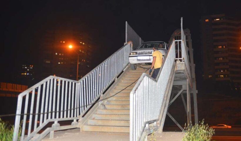 Turkey, car stuck in pedestrian bridge