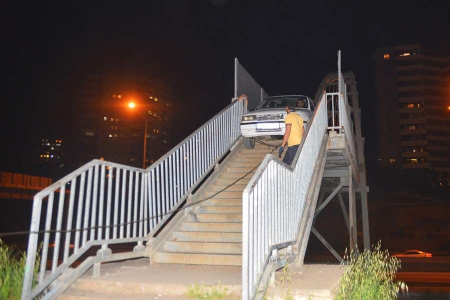 Turkey, car stuck in pedestrian bridge