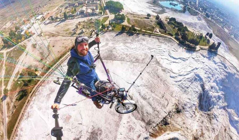 Turkey, paragliding on a motorbike over Pamukkale