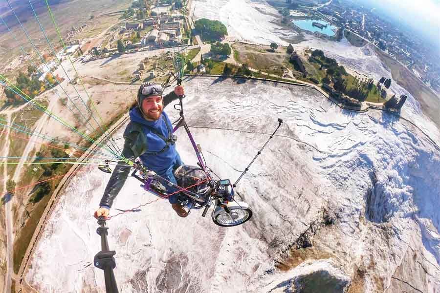 Turkey, paragliding on a motorbike over Pamukkale