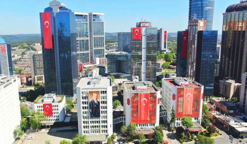 Istanbul, skyscrapers with flags of Turkey