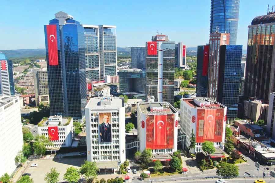 Istanbul, skyscrapers with flags of Turkey