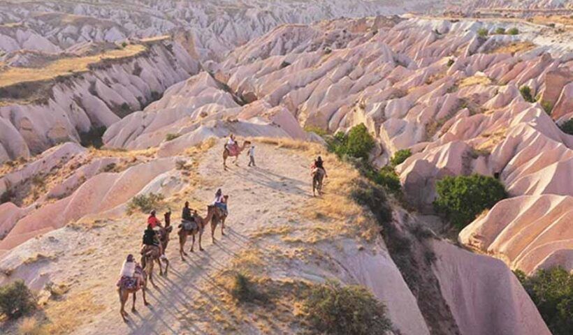 Turkey, tourists in Cappadocia