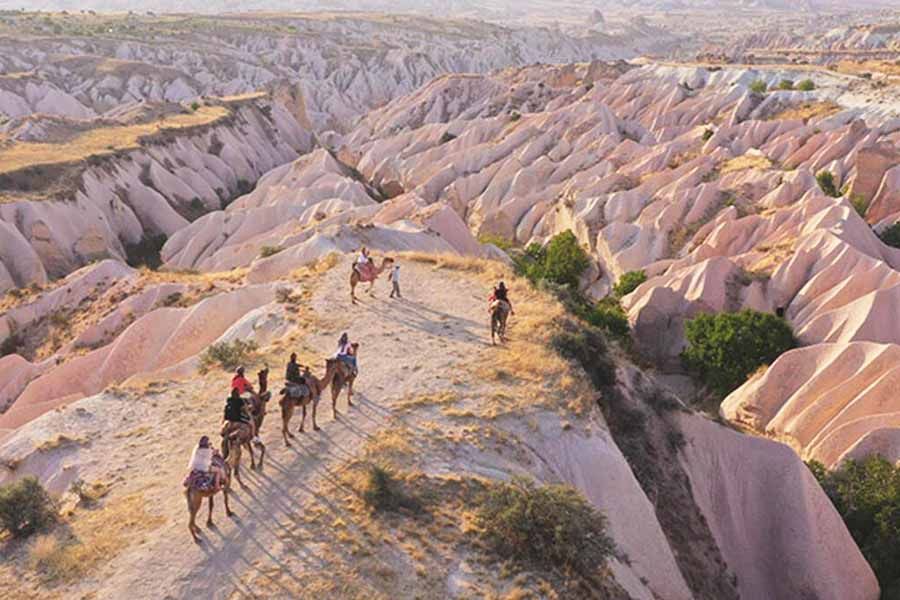 Turkey, tourists in Cappadocia