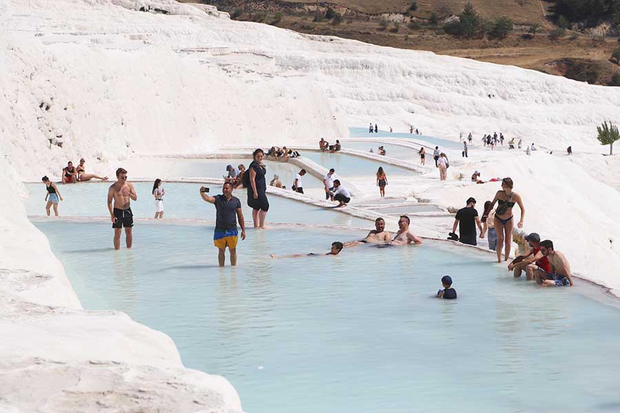 Turkey, tourists in Pamukkale