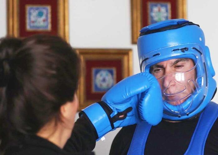 Istanbul, man earns money taking hits