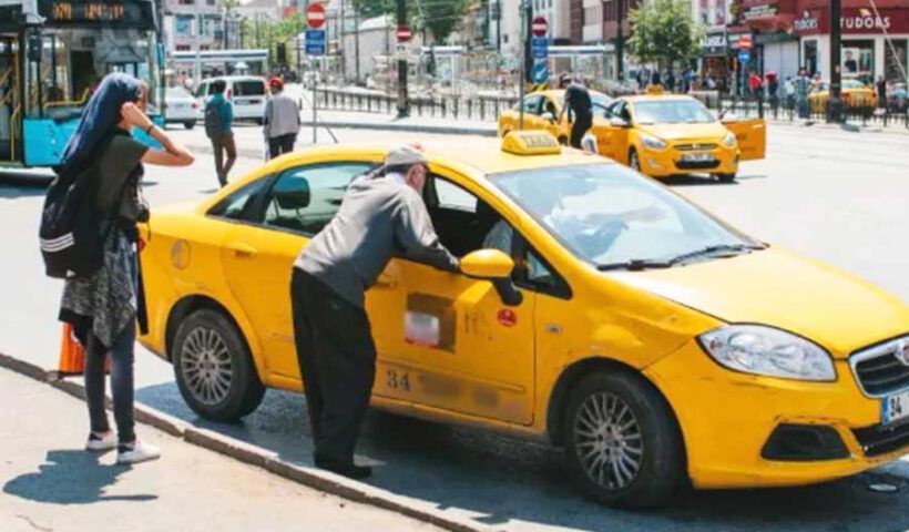 Turkey, taxi driver and passengers