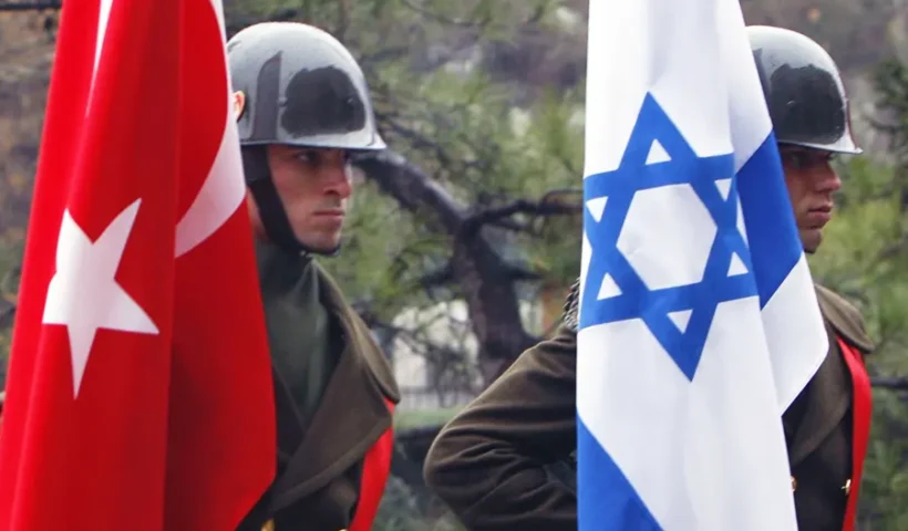 Turkish soldiers with flags of Turkey and Israel