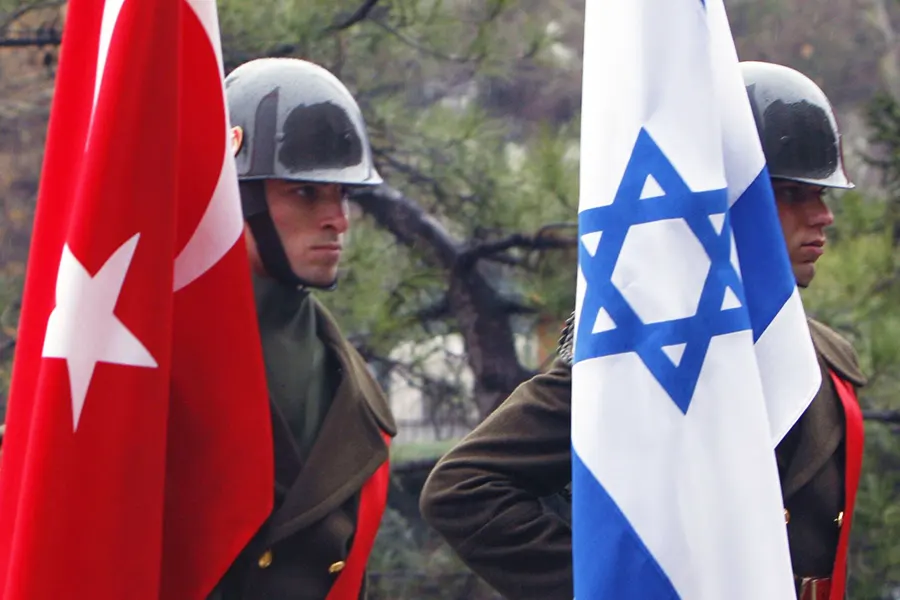 Turkish soldiers with flags of Turkey and Israel