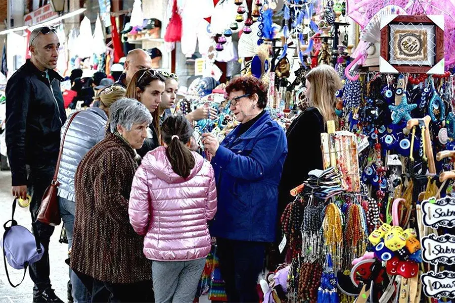 tourists doing some shopping in a bazaar