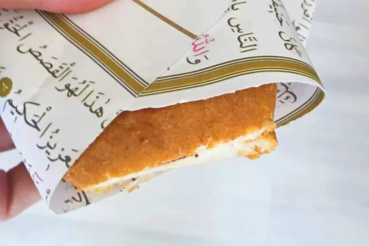 sandwich wrapped with Quran pages in a school in Turkey