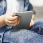 child with mobile phone