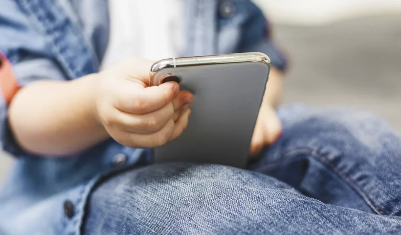 child with mobile phone