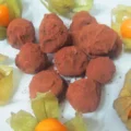 a dessert of double crunchy chocolate truffles with Physalis