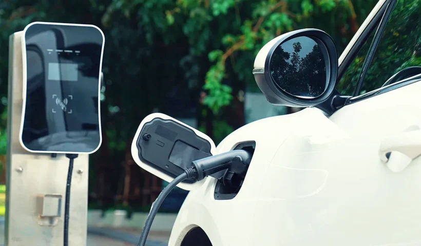 an electric car charging outdoors