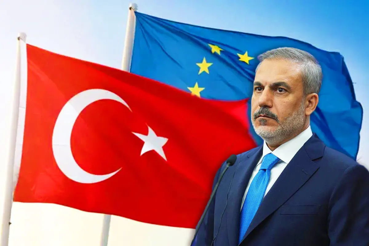 Turkish Foreign Minister Hakan Fidan with the EU-Turkey flag in the background