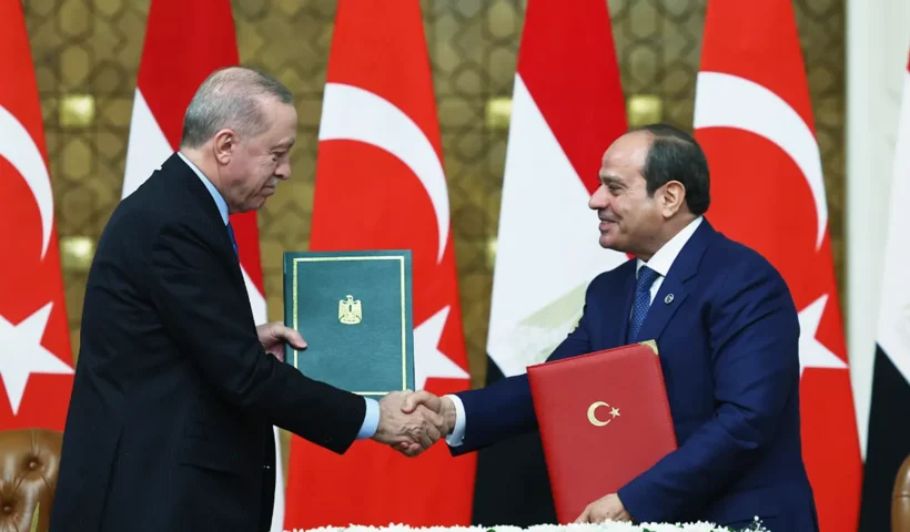 Turkish President Tayyip Erdogan and Egyptian President Al-Sisi shake hands after signing several agreements in Cairo.