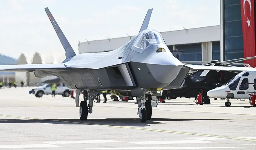Front view of the fifth-generation Turkish fighter jet Kaan on a runway.
