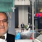 a lifeless body appears on the ground in front of a residential building with forensic teams inspecting the scene; in the foreground is the image of Turkish music producer Erol Köse