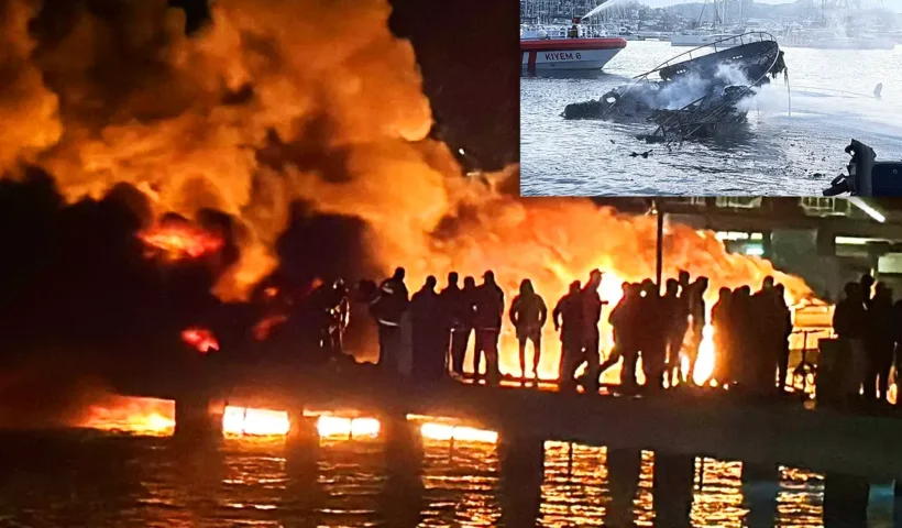 varias personas observan un gran incendio nocturno en el puerto de Bodrum, en una esquina aparece una imagen diurna del puerto con un yate hundido