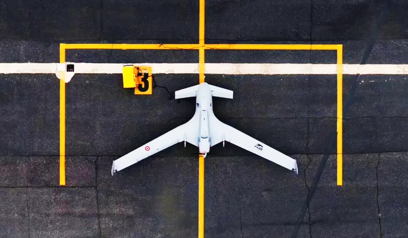 aerial image of the Turkish kamikaze drone Baykar K, positioned on a take-off runway