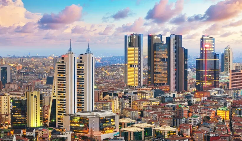 image of skyscrapers in the Levent district, Istanbul, lit up at dusk