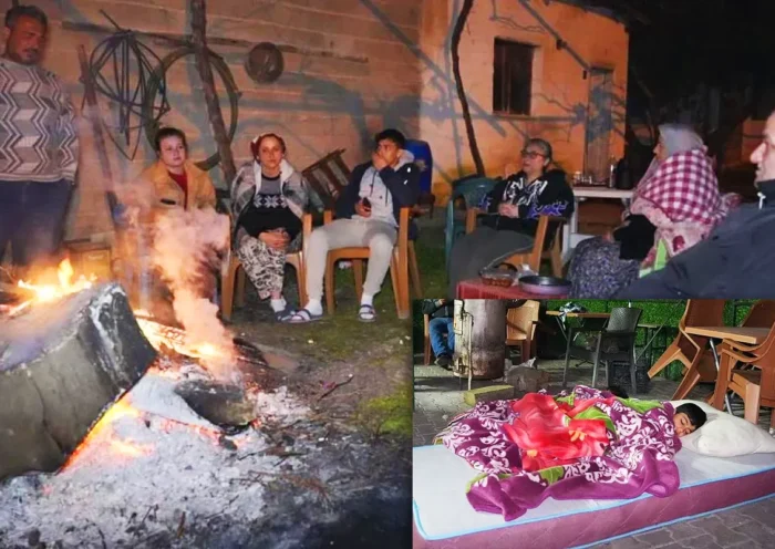 images of residents of the Turkish district of Buldan sleeping on makeshift mattresses or gathered around bonfires in fear of aftershocks after the earthquake