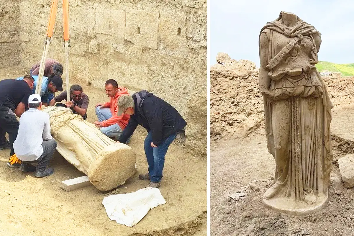 arqueólogos levantan una estatua enorme de la diosa Atenea desprovista de cabeza