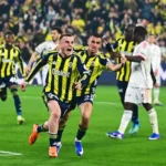 Fenerbahçe players celebrate wildly after scoring a goal during a match against Beşiktaş