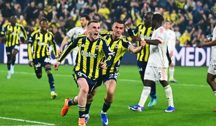 Fenerbahçe players celebrate wildly after scoring a goal during a match against Beşiktaş