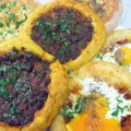 several round stuffed pastries, representing the Bursa cantık recipe