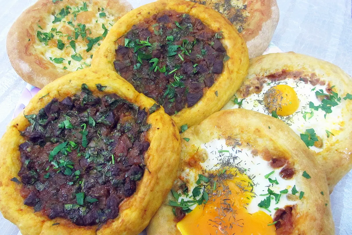 several round stuffed pastries, representing the Bursa cantık recipe