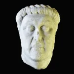 a Roman marble head dating from the 5th century AD, depicting the face of a man who held a position of authority