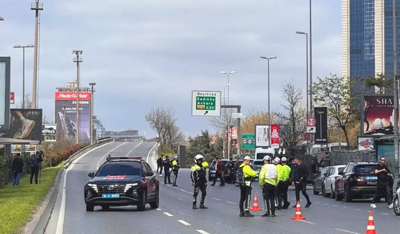 several police officers on an avenue in Istanbul's Levent financial district amid a major security operation