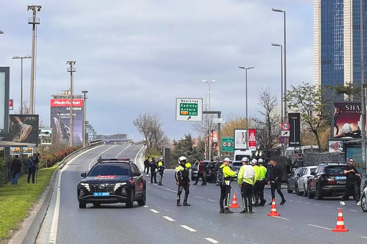 several police officers on an avenue in Istanbul's Levent financial district amid a major security operation