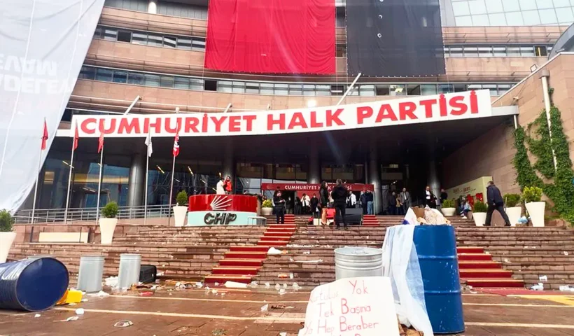 Images of the CHP party headquarters in Ankara following the police raid, showing the stairwell littered with remnants of banners and other objects