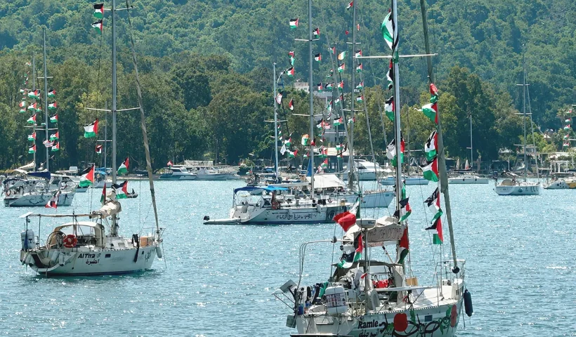 Ships from the Global Sumud Flotilla flying Palestinian flags anchored in a Turkish port