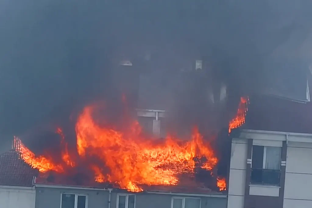 Fire on the roof of one of the burning buildings