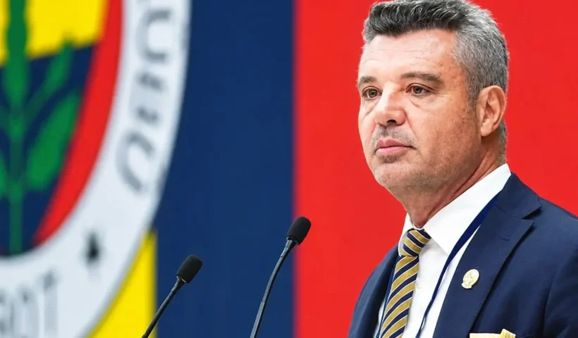 Fenerbahçe President Sadettin Saran is shown in the foreground speaking into two microphones; in the background is a huge Fenerbahçe crest