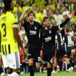 Beşiktaş players celebrate a goal scored against Fenerbahçe