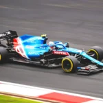 a racing car racing round an F1 circuit